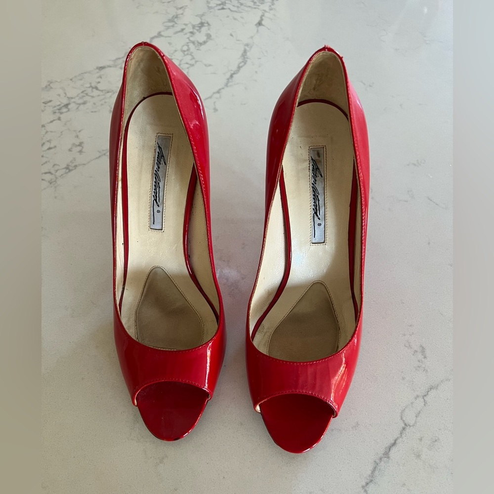 Brian Atwood red patent leather open toe pump. Size 39.